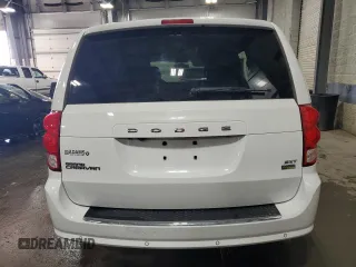 2014 Dodge Grand Caravan SXT with VIN 2C4RDGCG6ER427435, listed as a Copart auction lot 51957355 with 106,078 mi miles and Salvage Title. Bid and sale history available at DreamBid. Image 6.