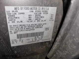 2004 Ford Escape XLT with VIN 1FMYU93174KA69760, listed as a IAAI auction lot 41725347 with 232,740 mi miles. Bid and sale history available at carsss.com. Image 9.