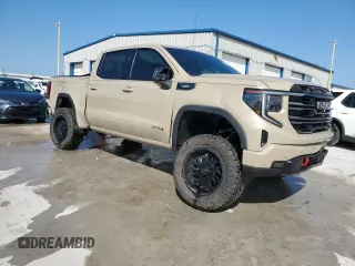 2023 GMC Sierra 1500 AT4 with VIN 1GTUUEE89PZ218574, listed as a Copart auction lot 55883305 with 34,239 mi miles and Salvage title. Bid and sale history available at DreamBid. Image 4.