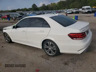 2014 Mercedes-Benz E 350 Sport with VIN WDDHF5KB9EA900559, listed as a Copart auction lot 51069705 with 137,278 mi miles and Salvage title. Bid and sale history available at DreamBid. Image 2.