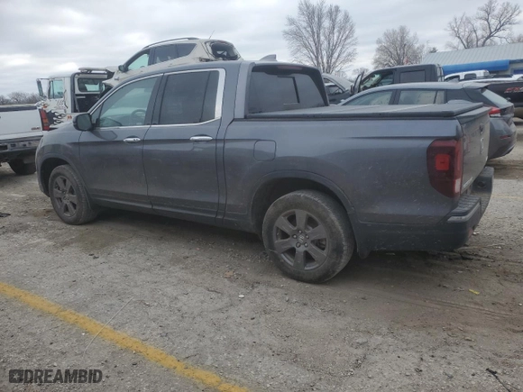 2020 Honda Ridgeline RTL-E with VIN 5FPYK3F73LB005001, listed as a Copart auction lot 86960494 with 39,714 mi miles and Salvage Title. Bid and sale history available at carsss.com. Image 2.
