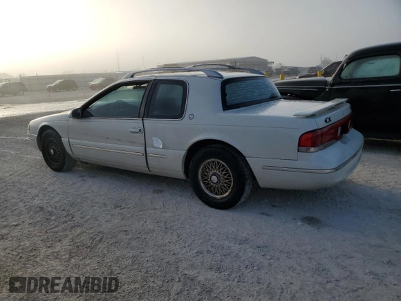 1997 Mercury Cougar z VIN 1MELM62W0VH602622, wystawiony jako Copart lot #77042354 z przebiegiem 122 027 mil mil oraz Nie do naprawy. Historia ofert i sprzedaży dostępna na DreamBid. Obrazek 2.