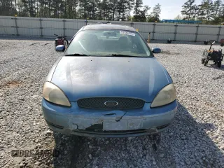2005 Ford Taurus SEL with VIN 1FAFP56215A234943, listed as a Copart auction lot 51486595 with 222,307 mi miles and Salvage Title. Bid and sale history available at DreamBid. Image 5.