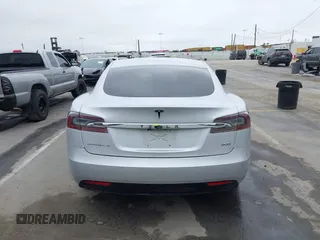 2016 Tesla Model S 90D with VIN 5YJSA1E23GF138925, listed as a IAAI auction lot 42408676 with 48,399 mi miles and . Bid and sale history available at DreamBid. Image 16.