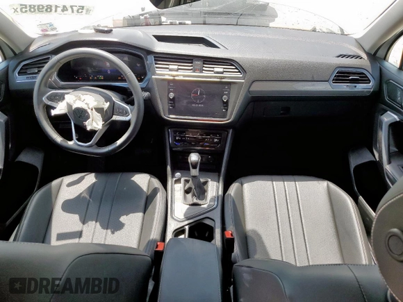 2023 Volkswagen Tiguan SE with VIN 3VV3B7AX7PM117286, listed as a Copart auction lot 57418985 with 21,162 mi miles and Salvage title. Bid and sale history available at DreamBid. Image 8.