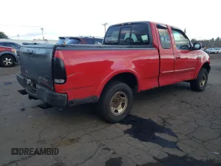 2000 Ford F-150 XL with VIN 1FTRX18W6YNC32005, listed as a Copart auction lot 82169314 with 289,320 mi miles and Salvage Title. Bid and sale history available at carsss.com. Image 3.