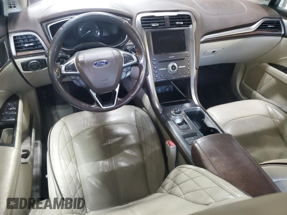 2017 Ford Fusion Titanium z VIN 3FA6P0K96HR132389, wystawiony jako Copart lot #57312665 z przebiegiem Nie podano mil oraz Szkoda całkowita • Salvage title. Historia ofert i sprzedaży dostępna na DreamBid. Obrazek 8.
