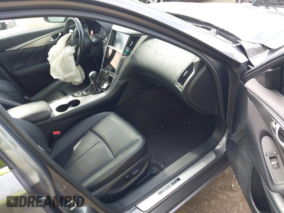 2015 Infiniti Q50 Premium z VIN JN1BV7AR1FM398047, wystawiony jako IAAI lot #42203862 z przebiegiem 104 002 mil mil oraz . Historia ofert i sprzedaży dostępna na DreamBid. Obrazek 5.