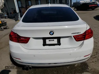 2015 BMW 4 Series 428i with VIN WBA4A9C58FGL85220, listed as a Copart auction lot 57128265 with 115,257 mi miles and Salvage title. Bid and sale history available at DreamBid. Image 6.