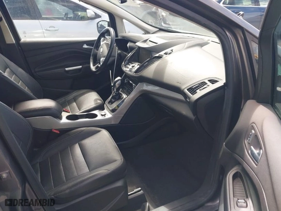 2014 Ford C-Max Hybrid SEL with VIN 1FADP5BU2EL507925, listed as a IAAI auction lot 41817702 with 137,490 mi miles. Bid and sale history available at carsss.com. Image 5.