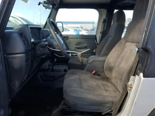2004 Jeep Wrangler Rubicon with VIN 1J4FA69S14P766938, listed as a Copart auction lot 46284815 with 165,229 mi miles and Salvage Title. Bid and sale history available at carsss.com. Image 7.