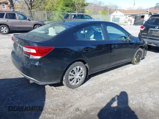 2019 Subaru Impreza with VIN 4S3GKAB68K3623755, listed as a IAAI auction lot 41933894 with 39,522 mi miles. Bid and sale history available at carsss.com. Image 4.