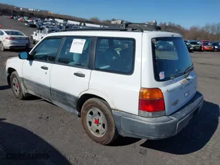 1999 Subaru Forester L with VIN JF1SF6355XH741974, listed as a IAAI auction lot 41973316 with 215,779 mi miles. Bid and sale history available at carsss.com. Image 3.