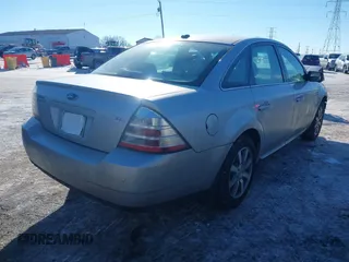 2009 Ford Taurus SEL with VIN 1FAHP24W89G104559, listed as a IAAI auction lot 41363916 with 89,297 mi miles. Bid and sale history available at carsss.com. Image 4.