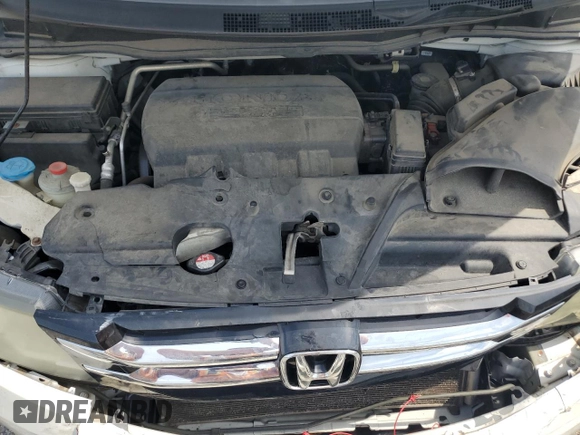 2014 Honda Odyssey Touring with VIN 5FNRL5H94EB080815, listed as a Copart auction lot 65244325 with 153,314 mi miles and Salvage title. Bid and sale history available at DreamBid. Image 12.