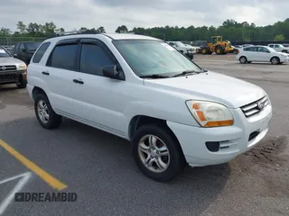 2006 Kia Sportage LX z VIN KNDJF723367287935, wystawiony jako IAAI lot #42428351 z przebiegiem 128 917 mil mil oraz . Historia ofert i sprzedaży dostępna na DreamBid. Obrazek 1.