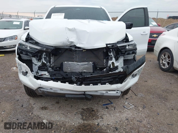 2024 Chevrolet Colorado 4WD Z71 with VIN 1GCPTDEK8R1231274, listed as a IAAI auction lot 42193922 with 9,198 mi miles and . Bid and sale history available at DreamBid. Image 6.