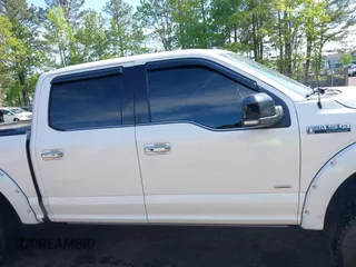 2015 Ford F-150 XLT with VIN 1FTEW1EG2FFC77044, listed as a IAAI auction lot 42094571 with 213,408 mi miles and . Bid and sale history available at DreamBid. Image 13.
