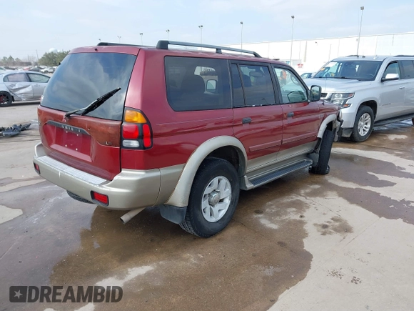 2001 Mitsubishi Montero Sport XLS with VIN JA4LS31H21P050687, listed as a IAAI auction lot 41532653 with 183,037 mi miles. Bid and sale history available at carsss.com. Image 4.