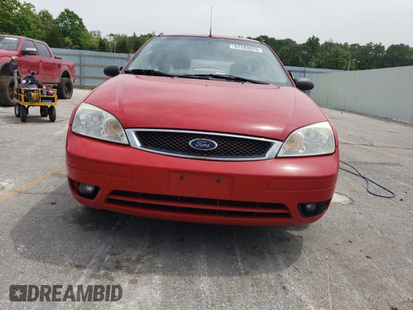 2007 Ford Focus S z VIN 1FAHP37N47W245222, wystawiony jako Copart lot #57293025 z przebiegiem 102 552 mil mil oraz Szkoda całkowita • Salvage title. Historia ofert i sprzedaży dostępna na DreamBid. Obrazek 5.