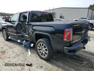 2017 GMC Sierra 1500 Denali with VIN 3GTU2PEC4HG512374, listed as a Copart auction lot 49444285 with 60,938 mi miles and Salvage Title. Bid and sale history available at DreamBid. Image 2.