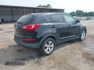 2012 Kia Sportage LX with VIN KNDPB3A28C7337795, listed as a IAAI auction lot 40118771 with 187,037 mi miles and . Bid and sale history available at DreamBid. Image 4.