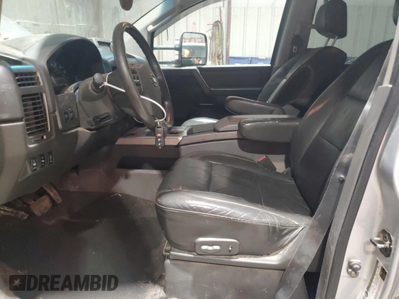 2007 Nissan Titan SE z VIN 1N6BA07B87N226908, wystawiony jako Copart lot #86951184 z przebiegiem 233 741 mil mil oraz Szkoda całkowita • Salvage title. Historia ofert i sprzedaży dostępna na DreamBid. Obrazek 7.