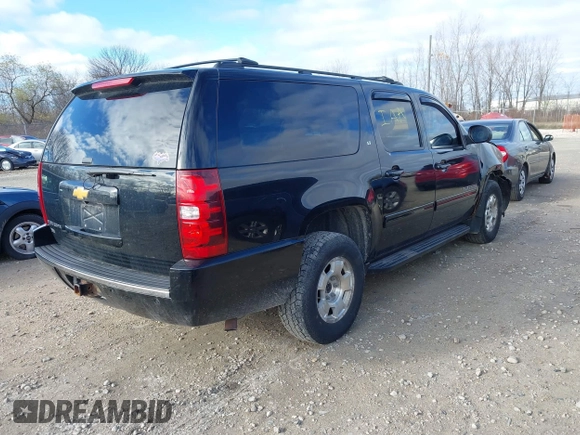 2014 Chevrolet Suburban LT with VIN 1GNSKJE71ER232700, listed as a IAAI auction lot 40812602 with 245,852 mi miles and . Bid and sale history available at DreamBid. Image 4.
