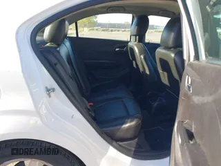 2016 Chevrolet Sonic LTZ z VIN 1G1JE5SB0G4144421, wystawiony jako IAAI lot #42020434 z przebiegiem 120 114 mil mil oraz . Historia ofert i sprzedaży dostępna na DreamBid. Obrazek 8.