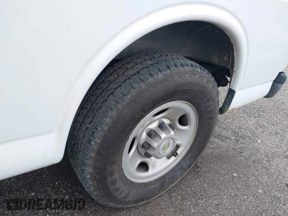 2013 Chevrolet Express Cargo with VIN 1GCWGFCA7D1123775, listed as a IAAI auction lot 41681686 with Not provided miles and . Bid and sale history available at DreamBid. Image 12.