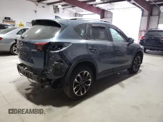 2016 Mazda CX-5 Grand Touring with VIN JM3KE4DY1G0714674, listed as a Copart auction lot 75516524 with 115,766 mi miles and Salvage Title. Bid and sale history available at carsss.com. Image 3.