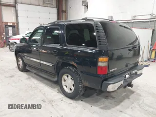 2005 GMC Yukon SLT with VIN 1GKEK13T15J143363, listed as a IAAI auction lot 41996424 with 272,819 mi miles. Bid and sale history available at carsss.com. Image 3.