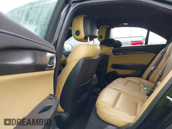 2013 Cadillac ATS z VIN 1G6AA5RA6D0122459, wystawiony jako IAAI lot #41549859 z przebiegiem 144 641 mil mil oraz . Historia ofert i sprzedaży dostępna na DreamBid. Obrazek 8.