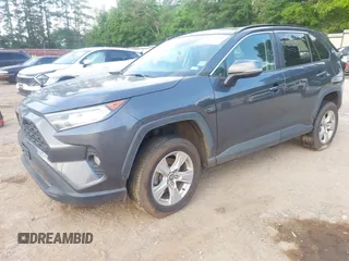 2020 Toyota RAV4 XLE with VIN 2T3P1RFV4LC090760, listed as a IAAI auction lot 42145099 with 73,909 mi miles and . Bid and sale history available at DreamBid. Image 2.