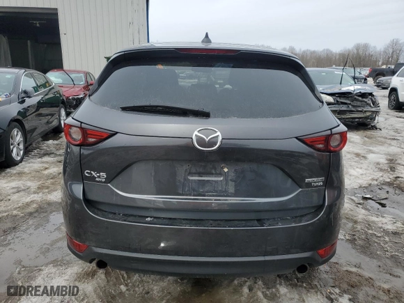 2021 Mazda CX-5 Grand Touring Reserve with VIN JM3KFBAY0M0439400, listed as a Copart auction lot 48891515 with 79,746 mi miles and Salvage Title. Bid and sale history available at carsss.com. Image 6.