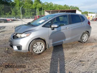 2017 Honda Fit LX with VIN JHMGK5H59HS015312, listed as a IAAI auction lot 42539428 with 75,263 mi miles and . Bid and sale history available at DreamBid. Image 2.