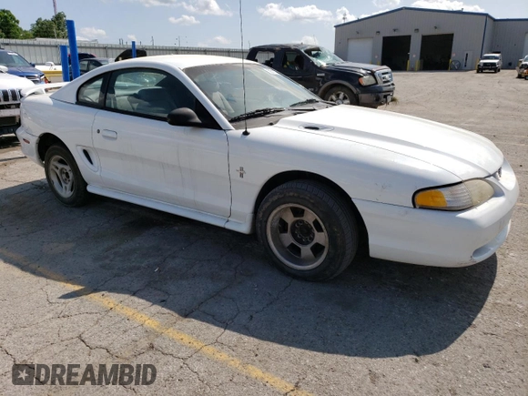1996 Ford Mustang with VIN 1FALP4041TF206244, listed as a Copart auction lot 56311934 with 123,572 mi miles and Salvage Title. Bid and sale history available at carsss.com. Image 4.
