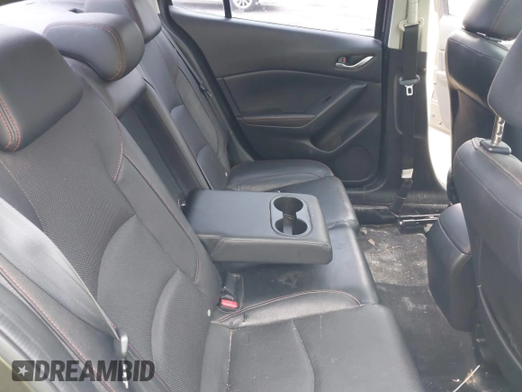 2014 Mazda 3 S Grand Touring with VIN JM1BM1W39E1145186, listed as a IAAI auction lot 41948404 with 111,702 mi miles and . Bid and sale history available at DreamBid. Image 8.