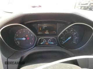 2018 Ford Focus SE z VIN 1FADP3F20JL257320, wystawiony jako Copart lot #55956435 z przebiegiem 26 919 mil mil oraz Szkoda całkowita • Salvage title. Historia ofert i sprzedaży dostępna na DreamBid. Obrazek 9.