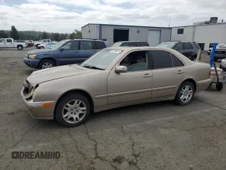 2001 Mercedes-Benz E-Class with VIN WDBJF70J31B293515, listed as a Copart auction lot 53100915 with 0 mi miles and Salvage Title. Bid and sale history available at carsss.com. Image 1.