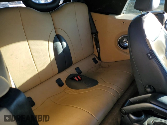 2008 MINI Convertible S with VIN WMWRH33598TU81236, listed as a Copart auction lot 42332895 with 140,607 mi miles and Salvage title. Bid and sale history available at DreamBid. Image 10.