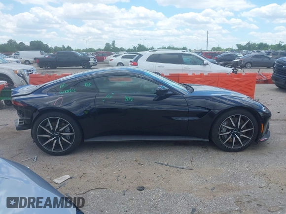 2020 Aston Martin Vantage z VIN SCFSMGAW4LGN03097, wystawiony jako IAAI lot #42227516 z przebiegiem Nie podano mil oraz . Historia ofert i sprzedaży dostępna na DreamBid. Obrazek 14.