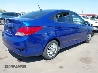 2014 Hyundai Accent GLS with VIN KMHCT4AE0EU655857, listed as a IAAI auction lot 41987827 with 172,535 mi miles. Bid and sale history available at carsss.com. Image 4.