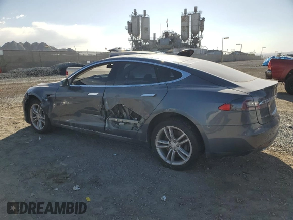2013 Tesla Model S with VIN 5YJSA1CG9DFP09733, listed as a Copart auction lot 87739005 with 88,163 mi miles and Salvage title. Bid and sale history available at DreamBid. Image 2.