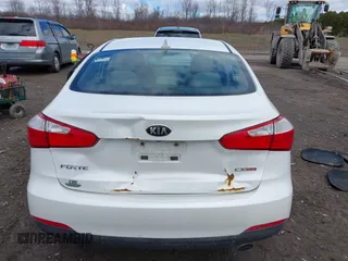 2014 Kia Forte EX with VIN KNAFX4A8XE5050378, listed as a IAAI auction lot 41923798 with 104,712 mi miles. Bid and sale history available at carsss.com. Image 16.