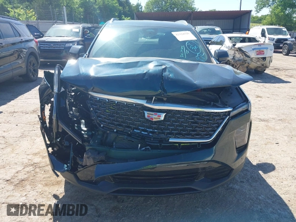2025 Cadillac XT4 FWD Premium Luxury z VIN 1GYFZCR47SF146106, wystawiony jako IAAI lot #42324320 z przebiegiem 4 601 mil mil oraz . Historia ofert i sprzedaży dostępna na DreamBid. Obrazek 12.