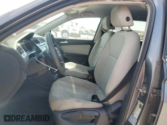 2020 Volkswagen Tiguan S with VIN 3VV0B7AX8LM025049, listed as a Copart auction lot 81767094 with 76,640 mi miles and Salvage title. Bid and sale history available at DreamBid. Image 7.