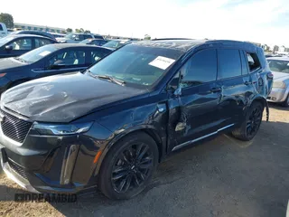 2020 Cadillac XT6 AWD Sport with VIN 1GYKPGRS1LZ170931, listed as a IAAI auction lot 40656458 with 80,168 mi miles and . Bid and sale history available at DreamBid. Image 6.