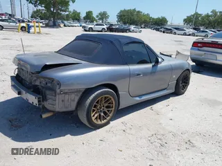 2003 Mazda MX-5 Miata Cloth with VIN JM1NB353930311340, listed as a IAAI auction lot 42145967 with 194,740 mi miles and . Bid and sale history available at DreamBid. Image 4.