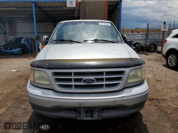 2002 Ford F-150 XL with VIN 1FTRF17242NB04340, listed as a Copart auction lot 58119345 with 218,734 mi miles and Non repairable. Bid and sale history available at DreamBid. Image 5.
